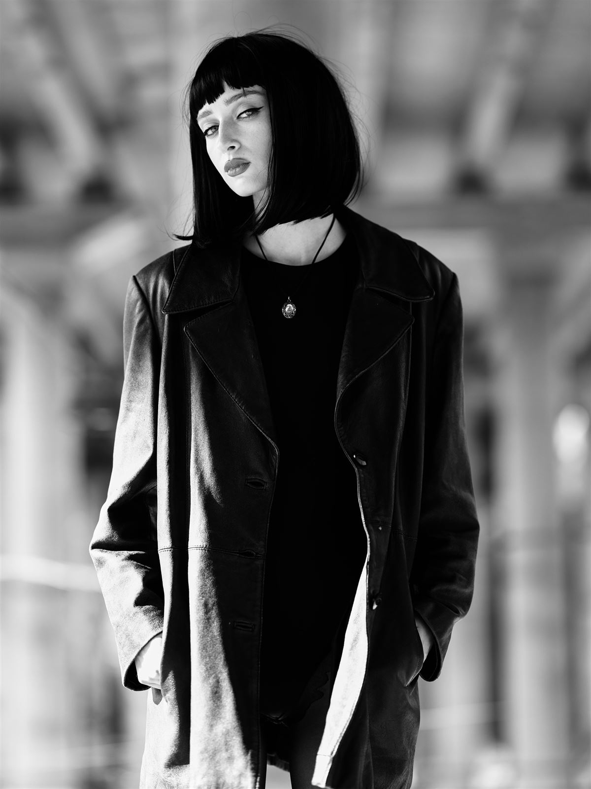 Arina Mura editorial portrait against architectural backdrop