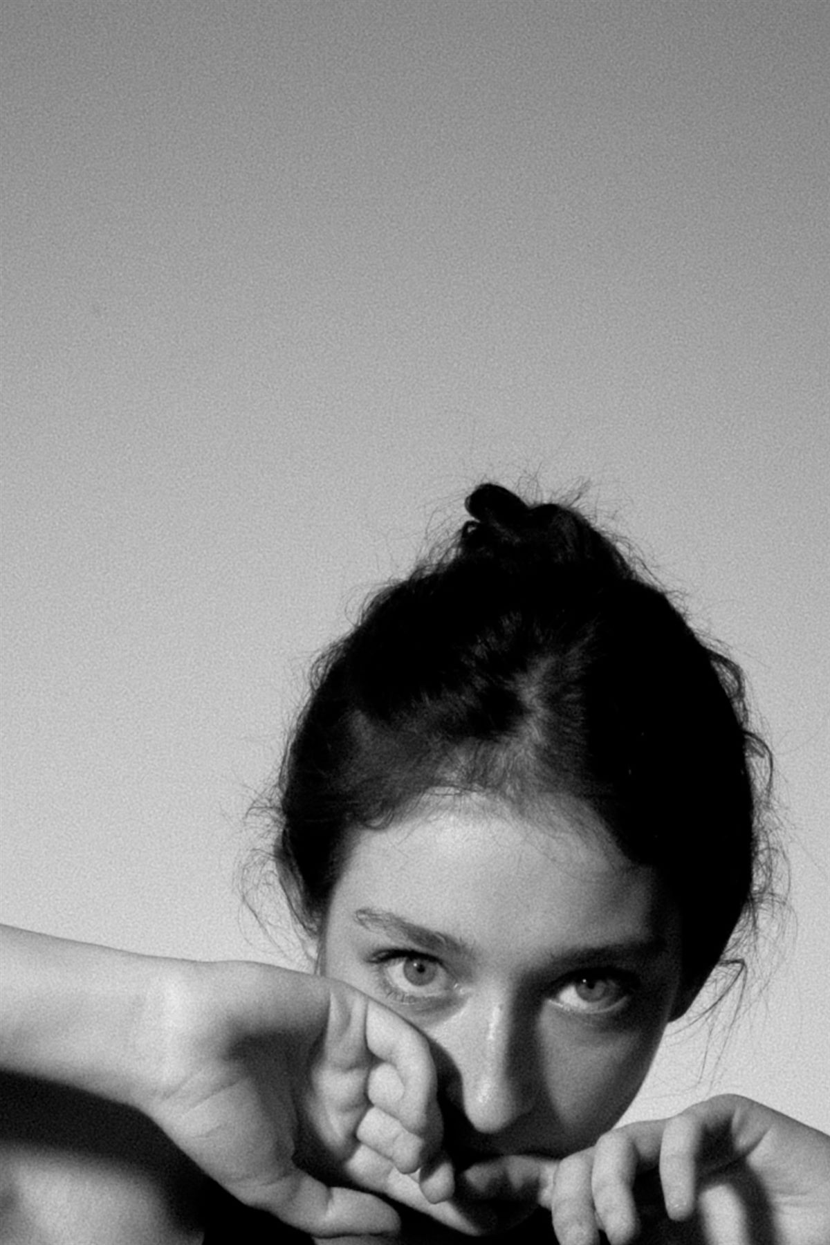 Close, intense artistic black and white portrait of Arina Mura